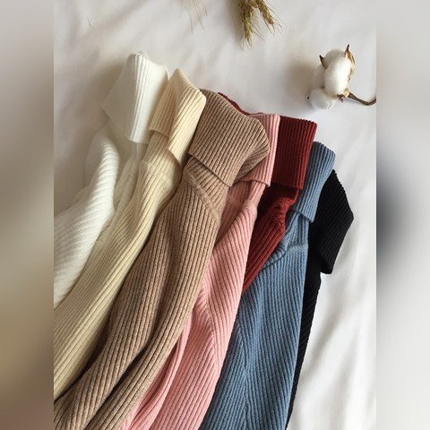 Folded ribbed roll neck jumpers in cream, pink, red and blue
